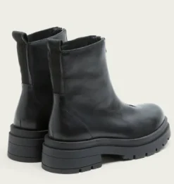 The Front Zip Lug Sole Bootie in Black